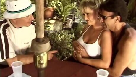 Gorgeous blonde enjoys an outdoor fuck with horny hunks
