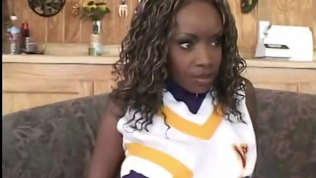 Pretty ebony cheerleader enjoys white cock banging