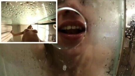 Brunette babe gives blowjob through a shower screen glory hole before getting fucked and eating cum